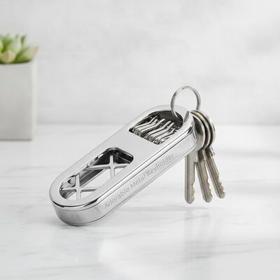 अच्छा दाम चांदी का प्यारा धातु कुंजी धारक मात्रा 1 टुकड़ा आधुनिक चिकना कुंजी आयोजक आसान कुंजी प्रबंधन और भंडारण के लिए डिज़ाइन किया गया ऑनलाइन